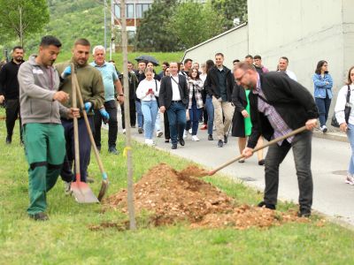 Planting trees for Earth Day in ITP Prizren